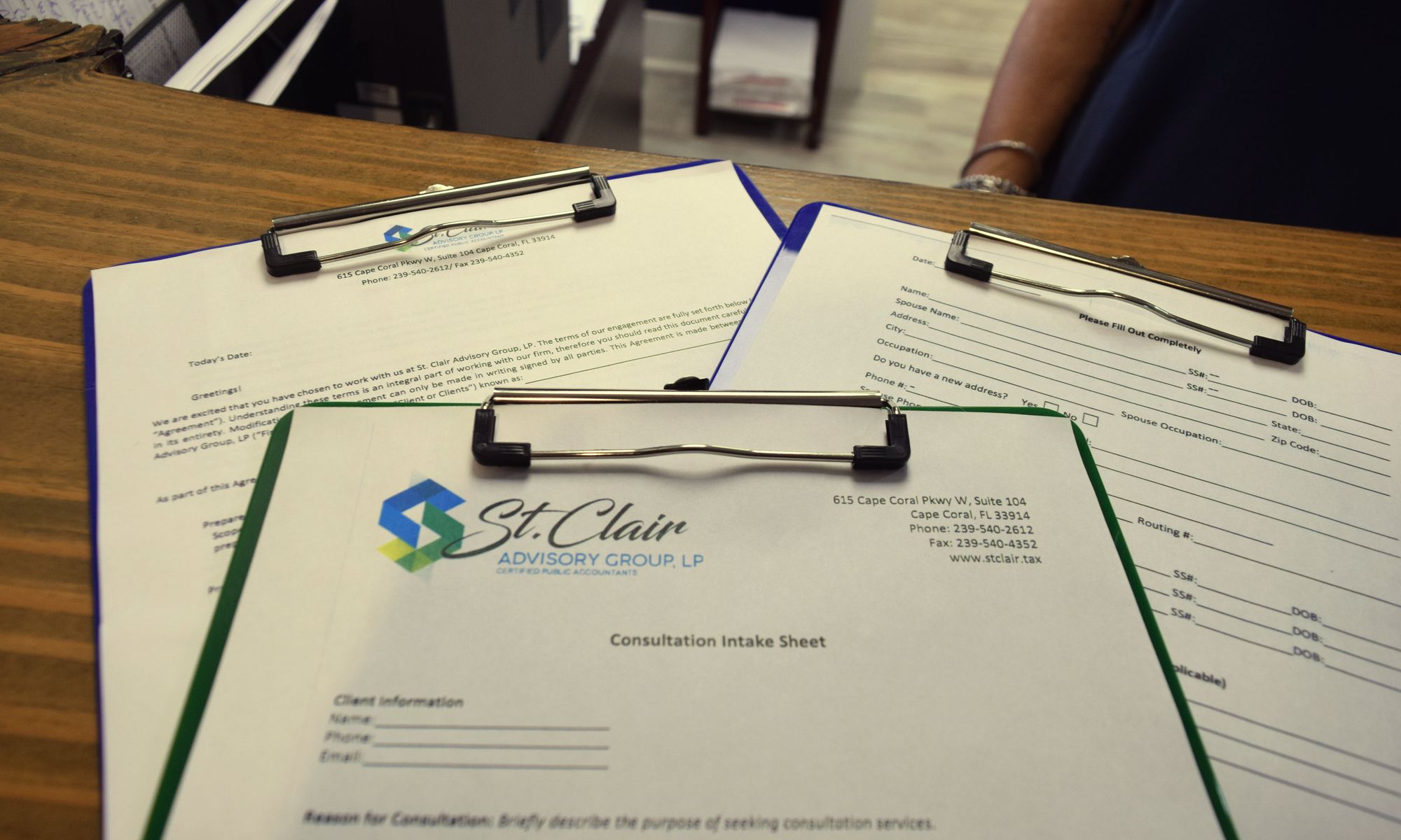 St. Clair intake forms on clipboards