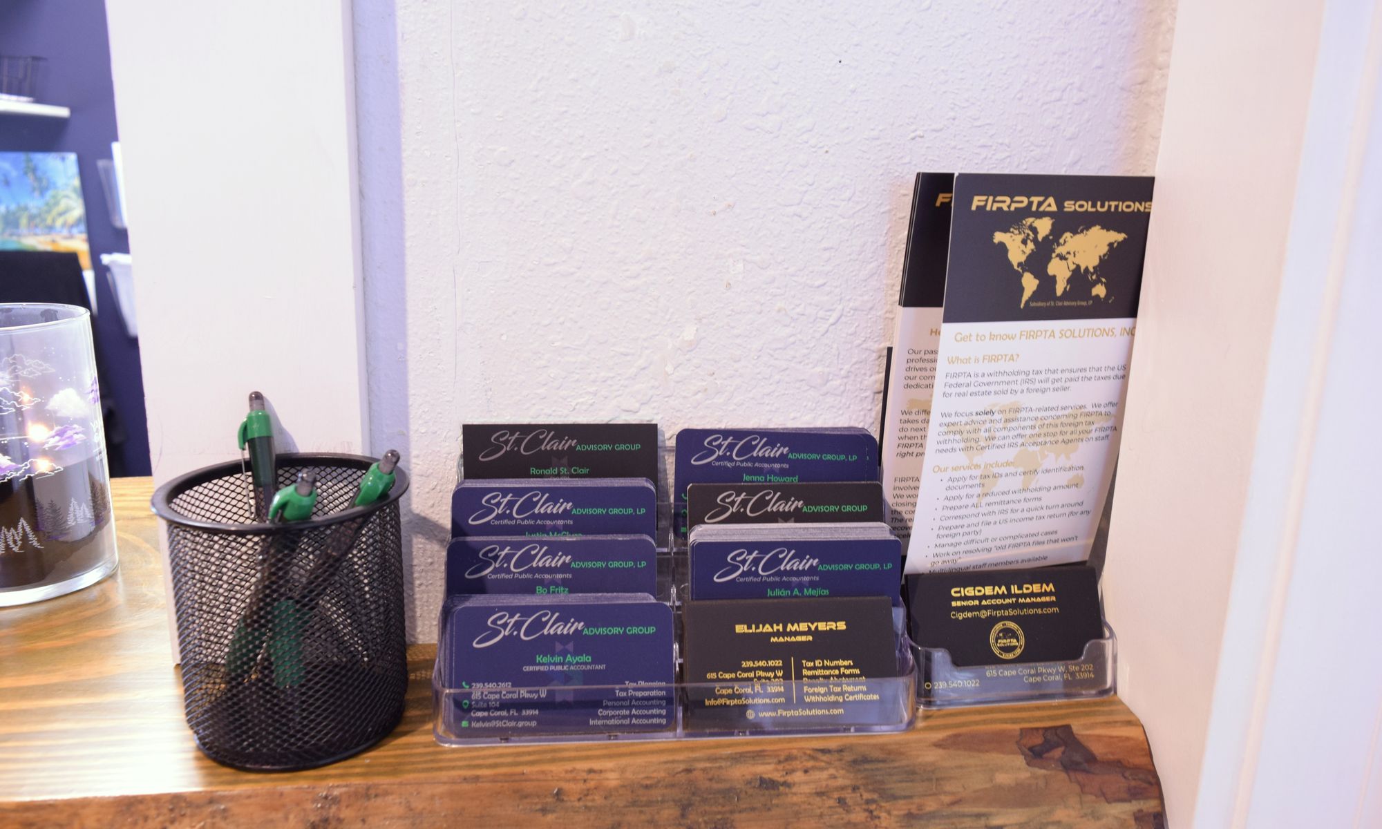 St. Clair reception counter with business cards and brochures