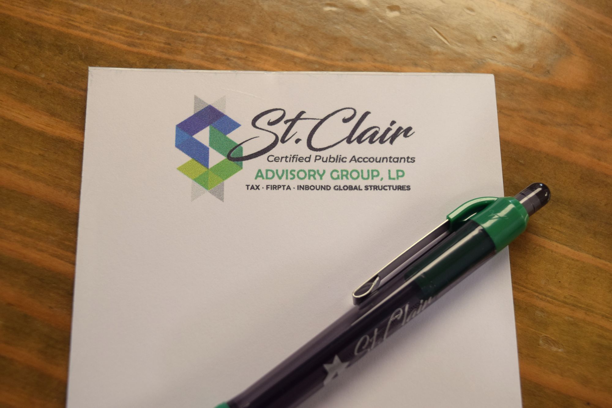 St. Clair letterhead and branded pen